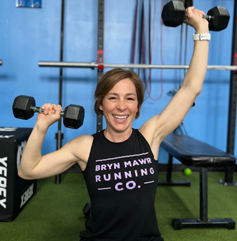 About 1 woman training at gym Plankd Fitness